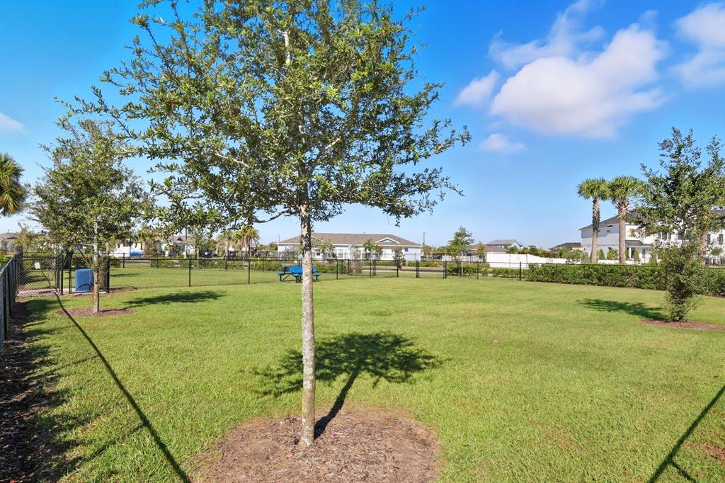 1782 Spreader Lane Sarasota, FL 34240 - Photo 36 of 38 a view of a golf course with a lake