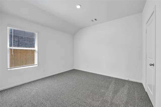 a bathroom with a shower sink and mirror