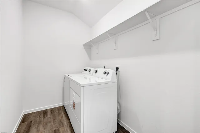 a utility room with dryer and washer
