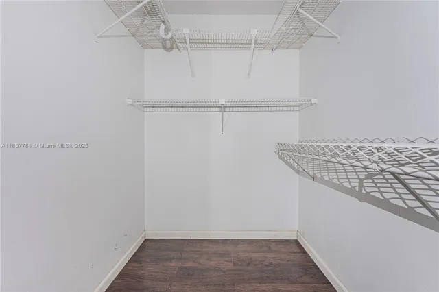 a view of a room with racks on the wall