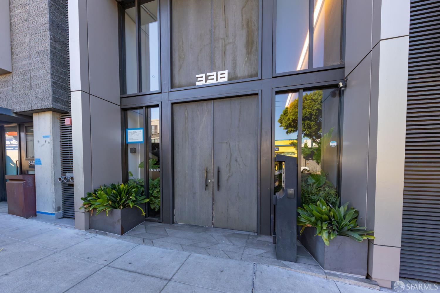 338 Potrero Avenue, Unit 206 San Francisco, CA 94103 - Photo 16 of 22 a view of an entryway with flower pots