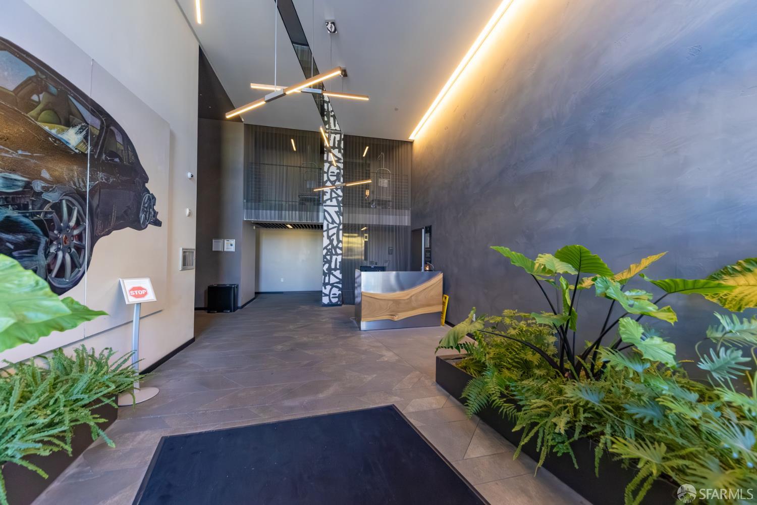 338 Potrero Avenue, Unit 206 San Francisco, CA 94103 - Photo 17 of 22 a lobby with furniture and a potted plant