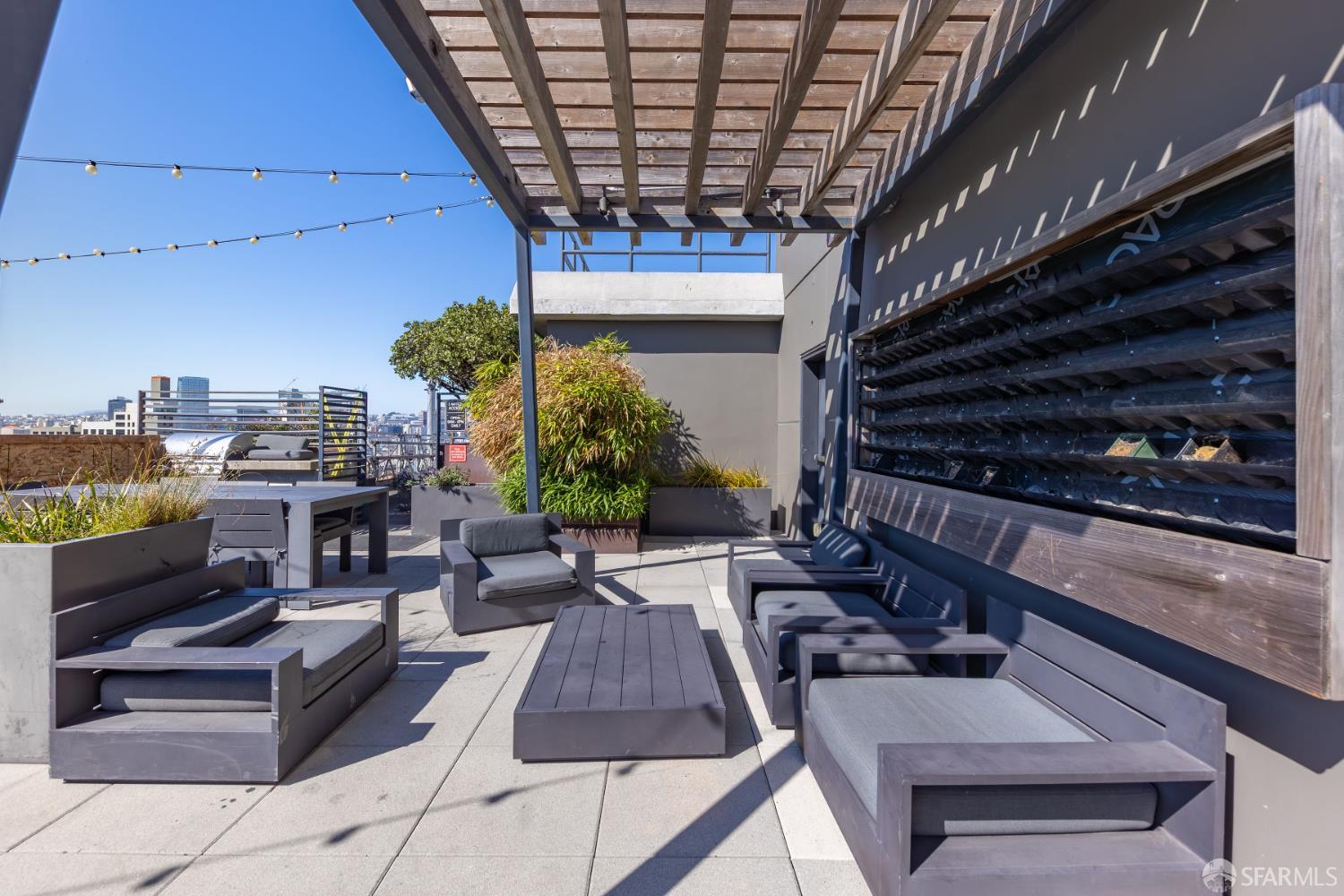 338 Potrero Avenue, Unit 206 San Francisco, CA 94103 - Photo 18 of 22 a view of a patio with couches and potted plants