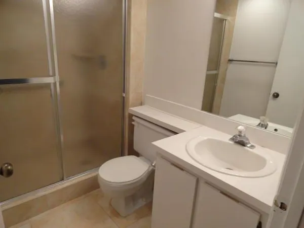 a living room with furniture chandelier and a chandelier