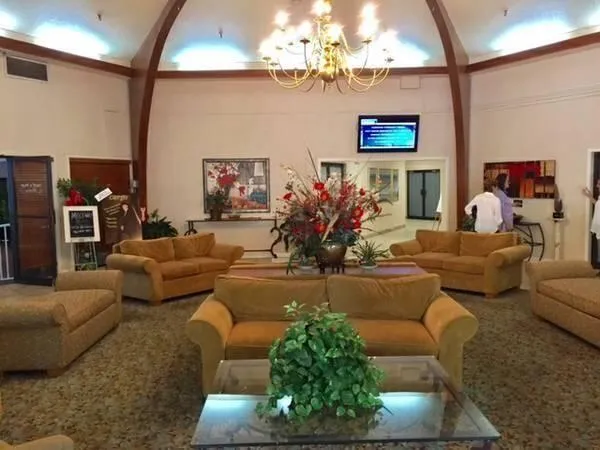 a view of a livingroom with furniture window and outside view