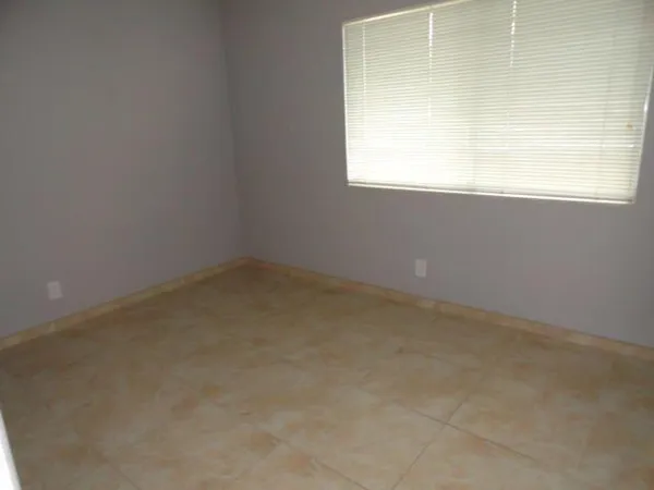 a bathroom with a shower and a toilet