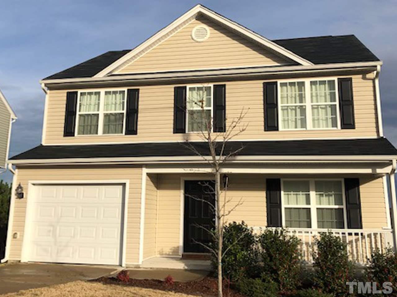 3453 Kernstown Drive Raleigh, NC 27610 - Photo 1 of 21 a front view of a house