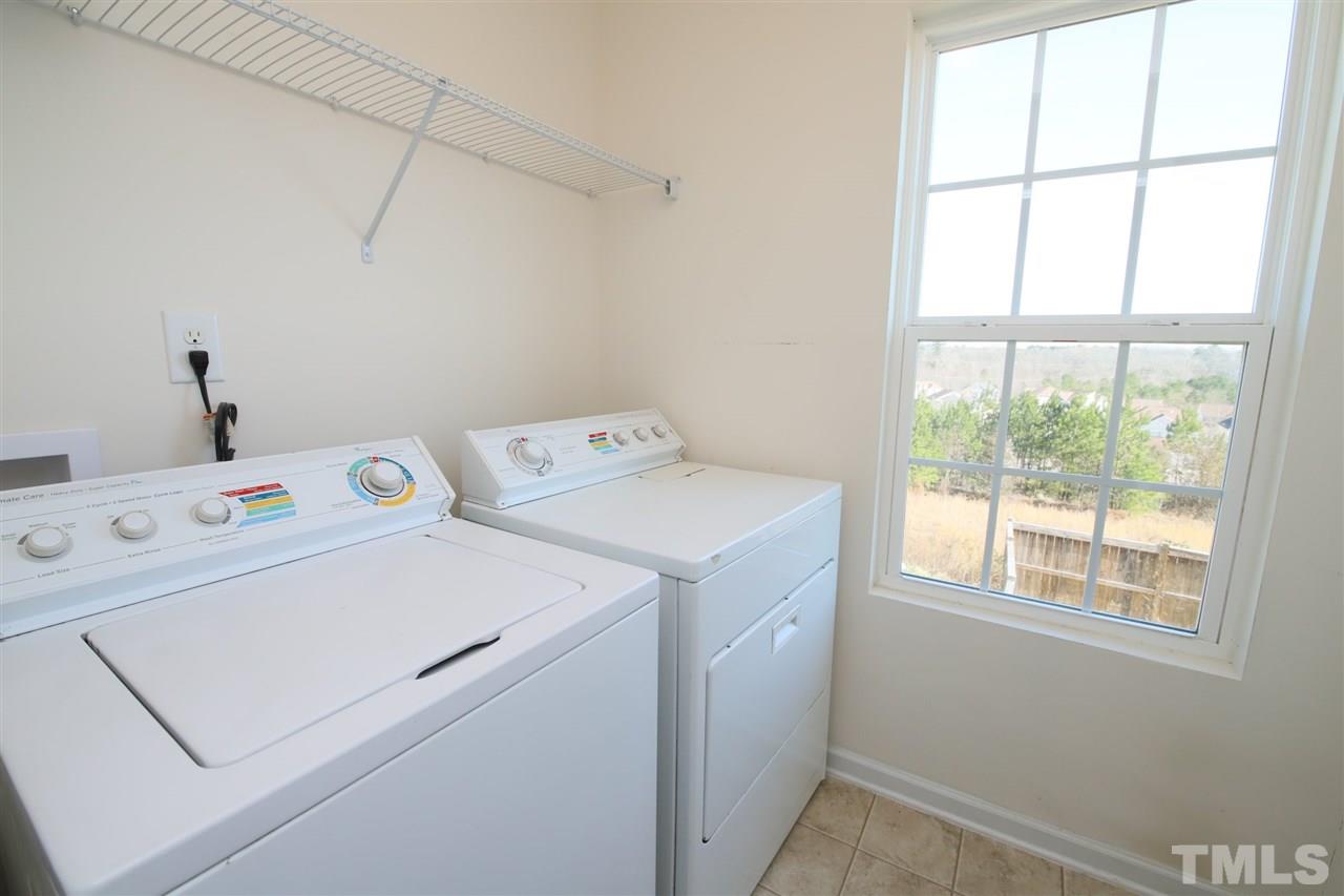 3453 Kernstown Drive Raleigh, NC 27610 - Photo 15 of 21 a utility room with dryer and washer