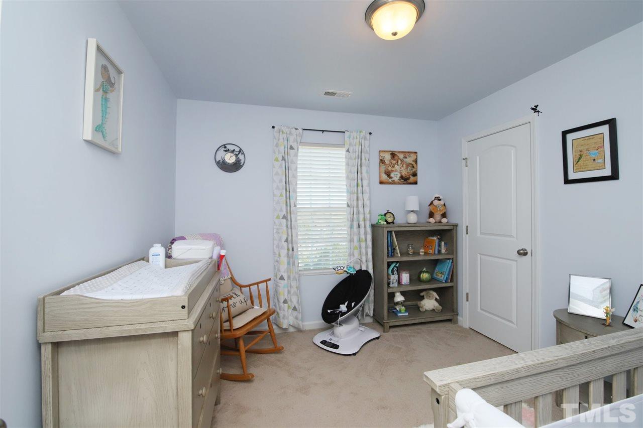 3453 Kernstown Drive Raleigh, NC 27610 - Photo 21 of 21 a view of a room with gym equipment