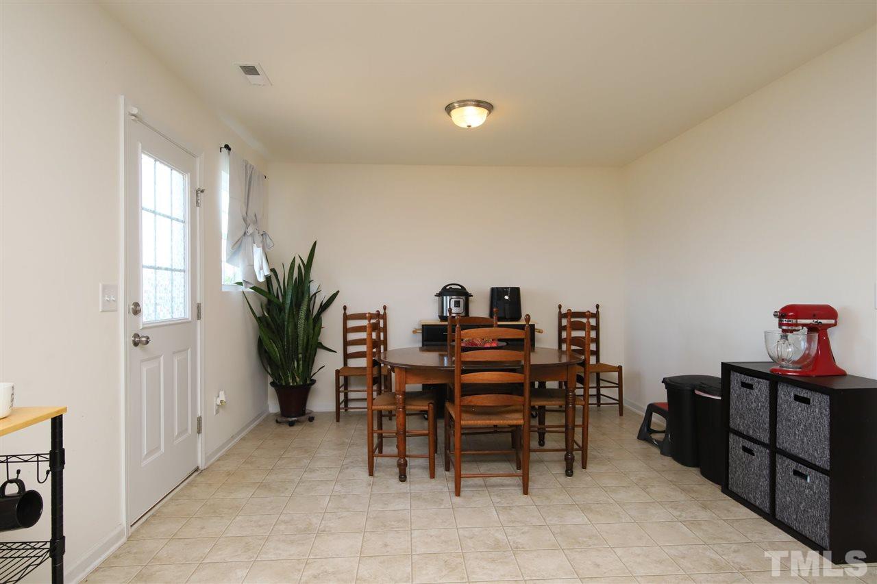 3453 Kernstown Drive Raleigh, NC 27610 - Photo 6 of 21 a dining room with furniture and window