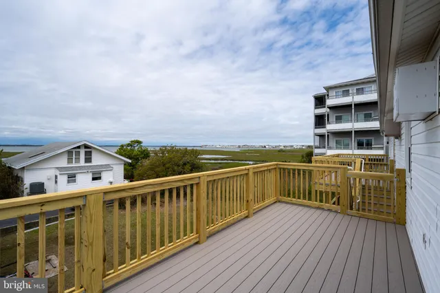 a view of balcony with furniture