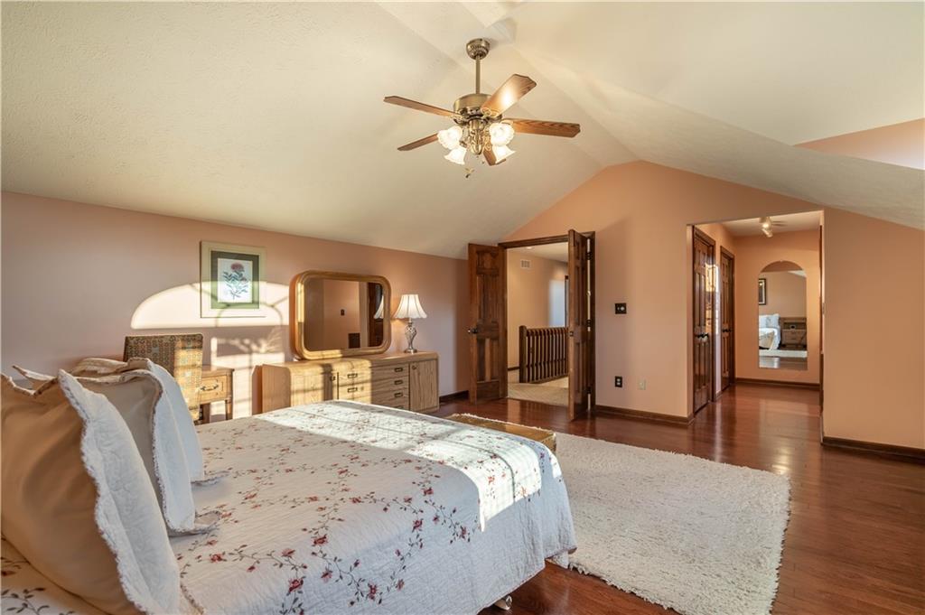 106 Roundtable Drive McMurray, PA 15317 - Photo 13 of 25 a bedroom with a bed and wooden floor