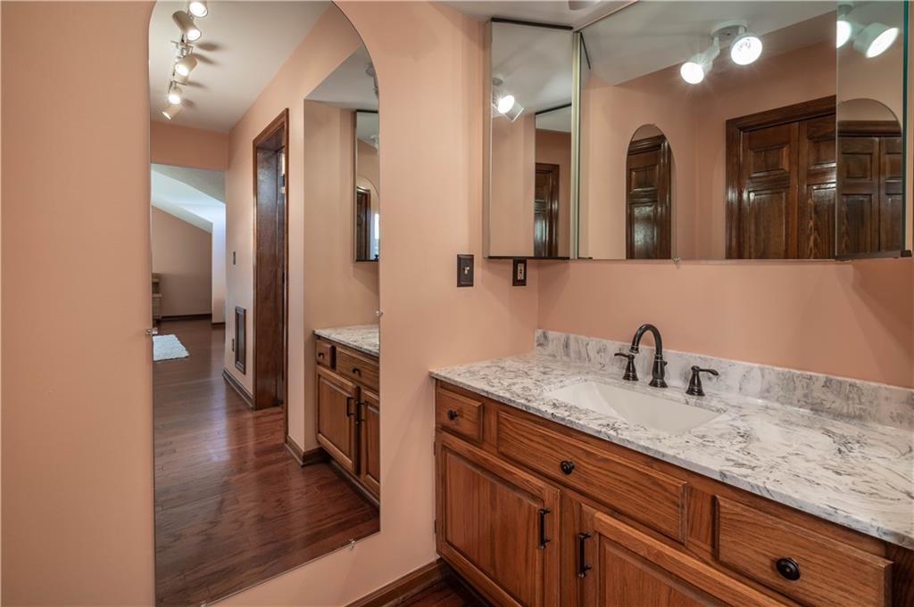 106 Roundtable Drive McMurray, PA 15317 - Photo 14 of 25 a bathroom with a sink and a mirror