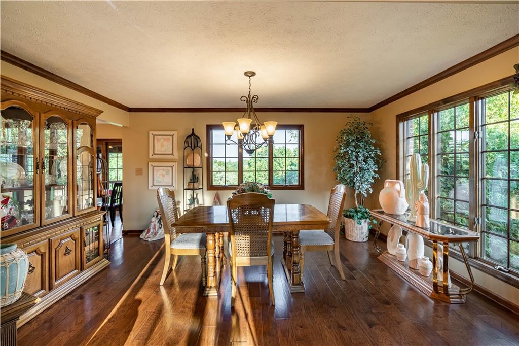 106 Roundtable Drive McMurray, PA 15317 - Photo 6 of 25 a view of a dining room with furniture window and wooden floor