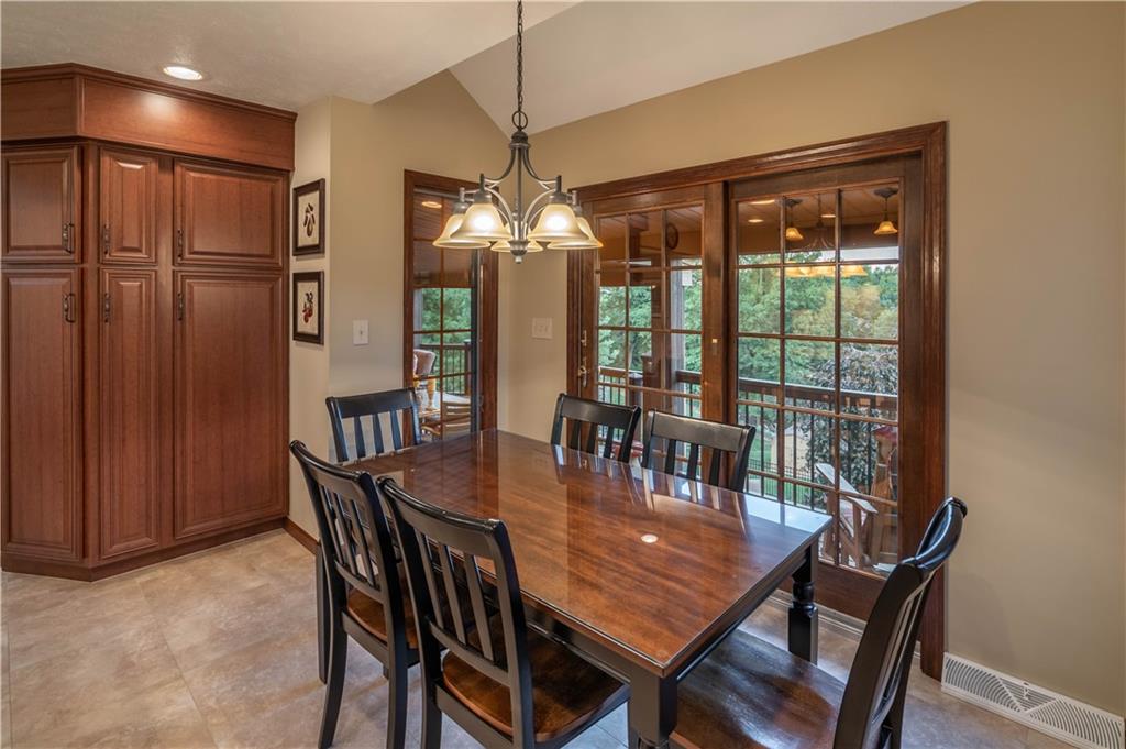 106 Roundtable Drive McMurray, PA 15317 - Photo 9 of 25 a dining room with furniture a chandelier and window