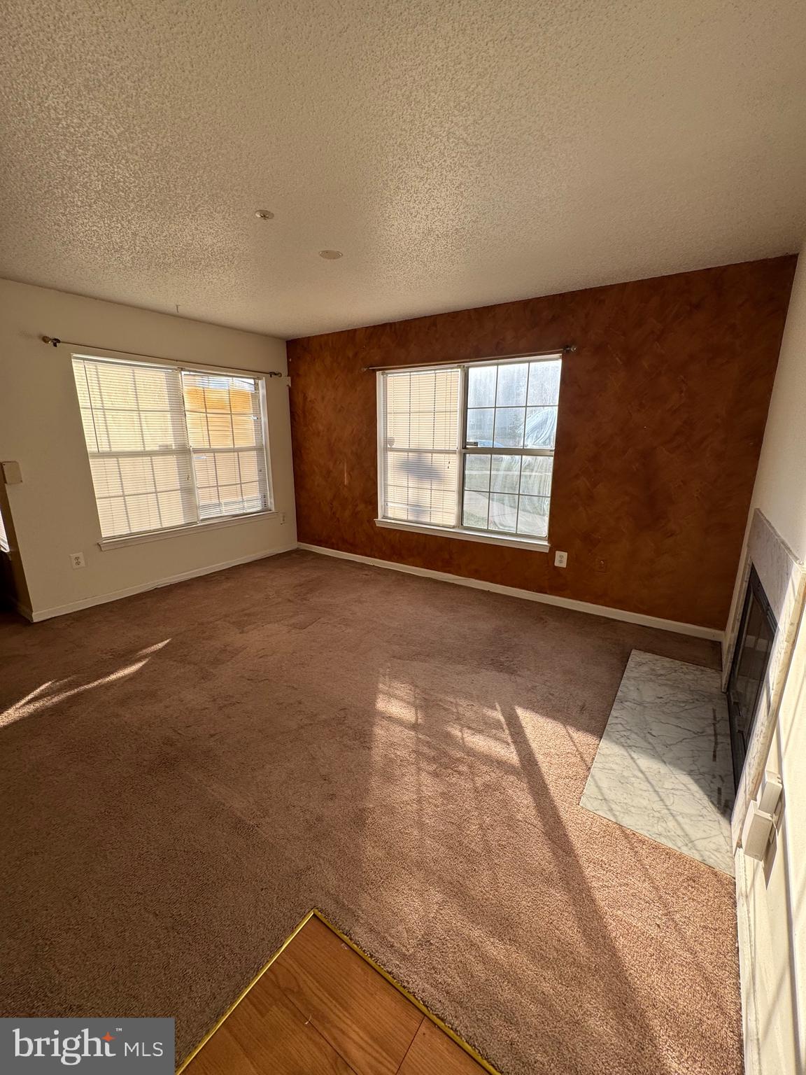 14121 Bowsprit Lane, Unit 301 Laurel, MD 20707 - Photo 3 of 8 an empty room with windows