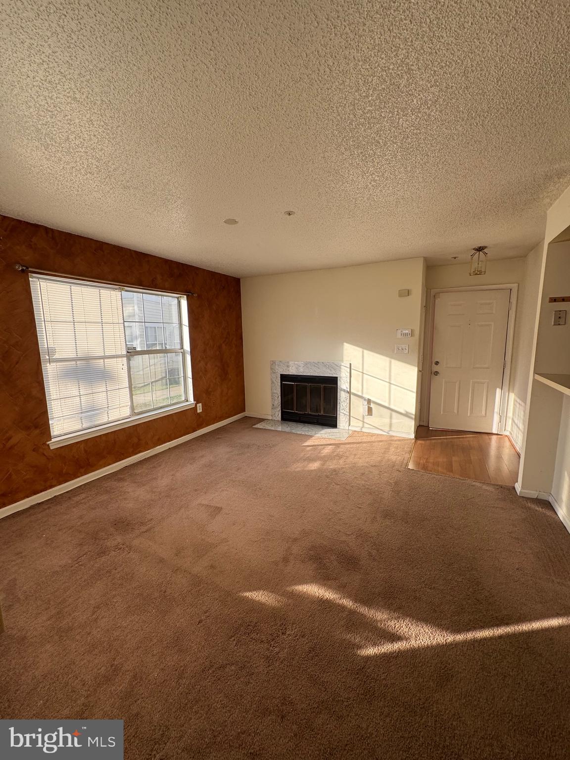 14121 Bowsprit Lane, Unit 301 Laurel, MD 20707 - Photo 4 of 8 a view of empty room with windows