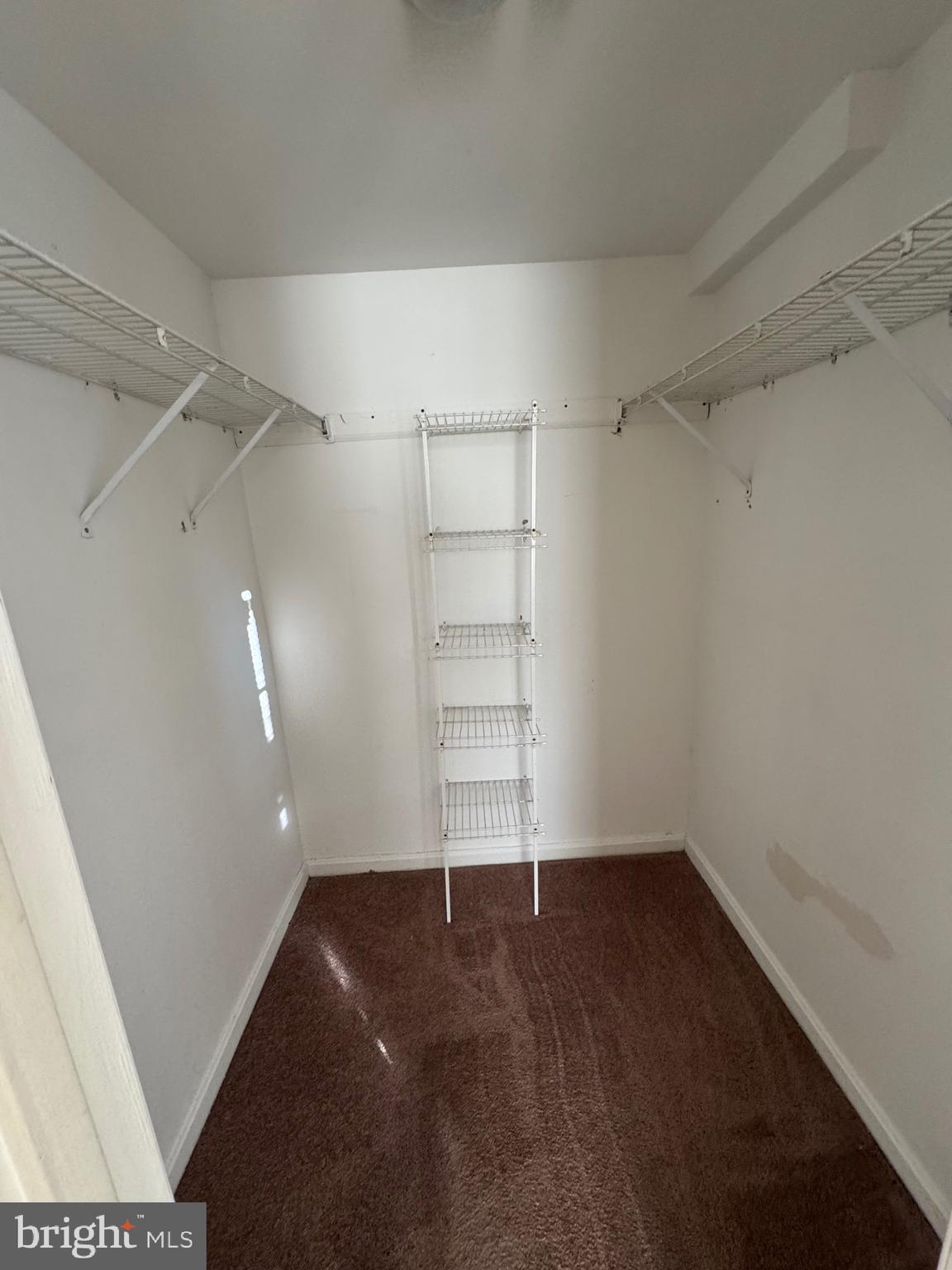 14121 Bowsprit Lane, Unit 301 Laurel, MD 20707 - Photo 8 of 8 a view of an empty walk in closet