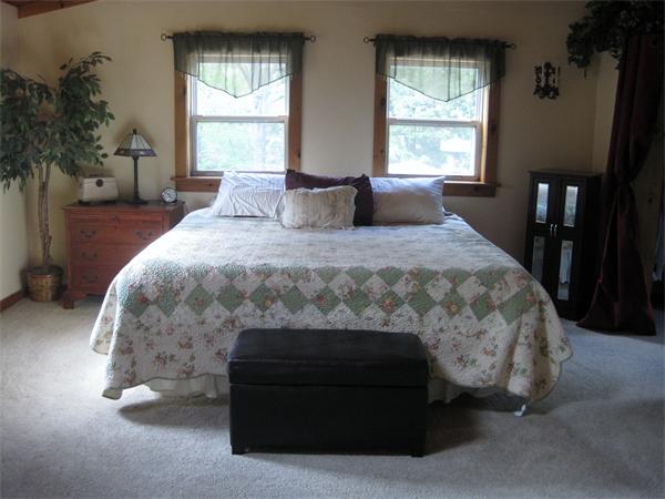 34 Kruse Road Hubbardston, MA 01452 - Photo 19 of 27 a bedroom with a bed and a window