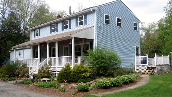 34 Kruse Road Hubbardston, MA 01452 - Photo 2 of 27 a house that has a lot of plants in it