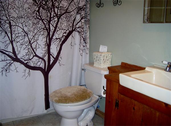 34 Kruse Road Hubbardston, MA 01452 - Photo 25 of 27 a bathroom with a sink and toilet