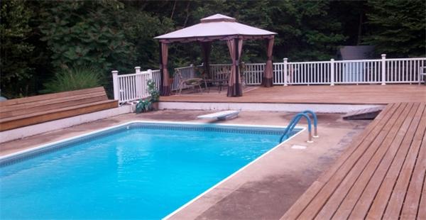 34 Kruse Road Hubbardston, MA 01452 - Photo 7 of 27 a backyard of a house with table and chairs