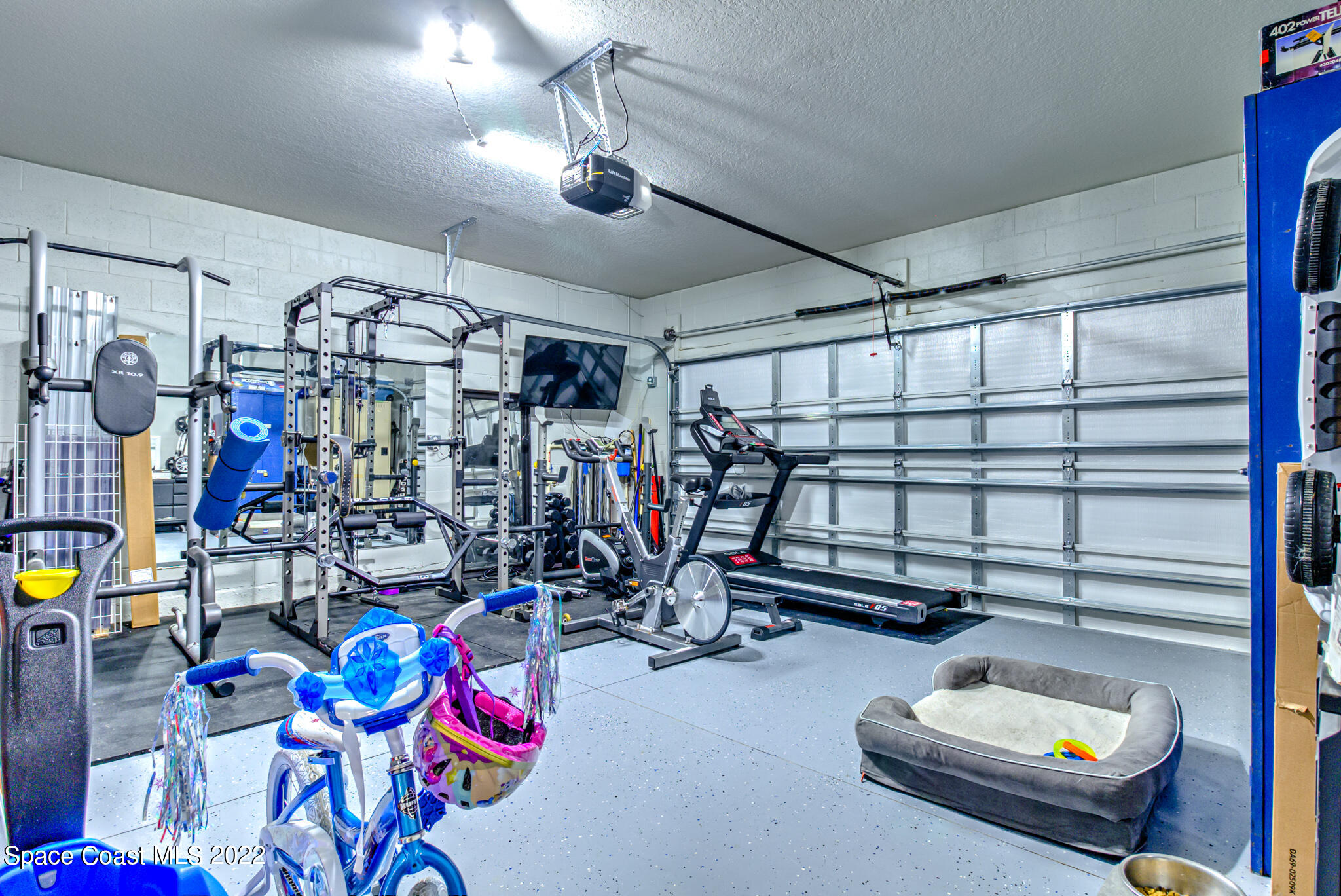 975 Newton Circle Rockledge, FL 32955 - Photo 24 of 30 a view of a room with gym equipment