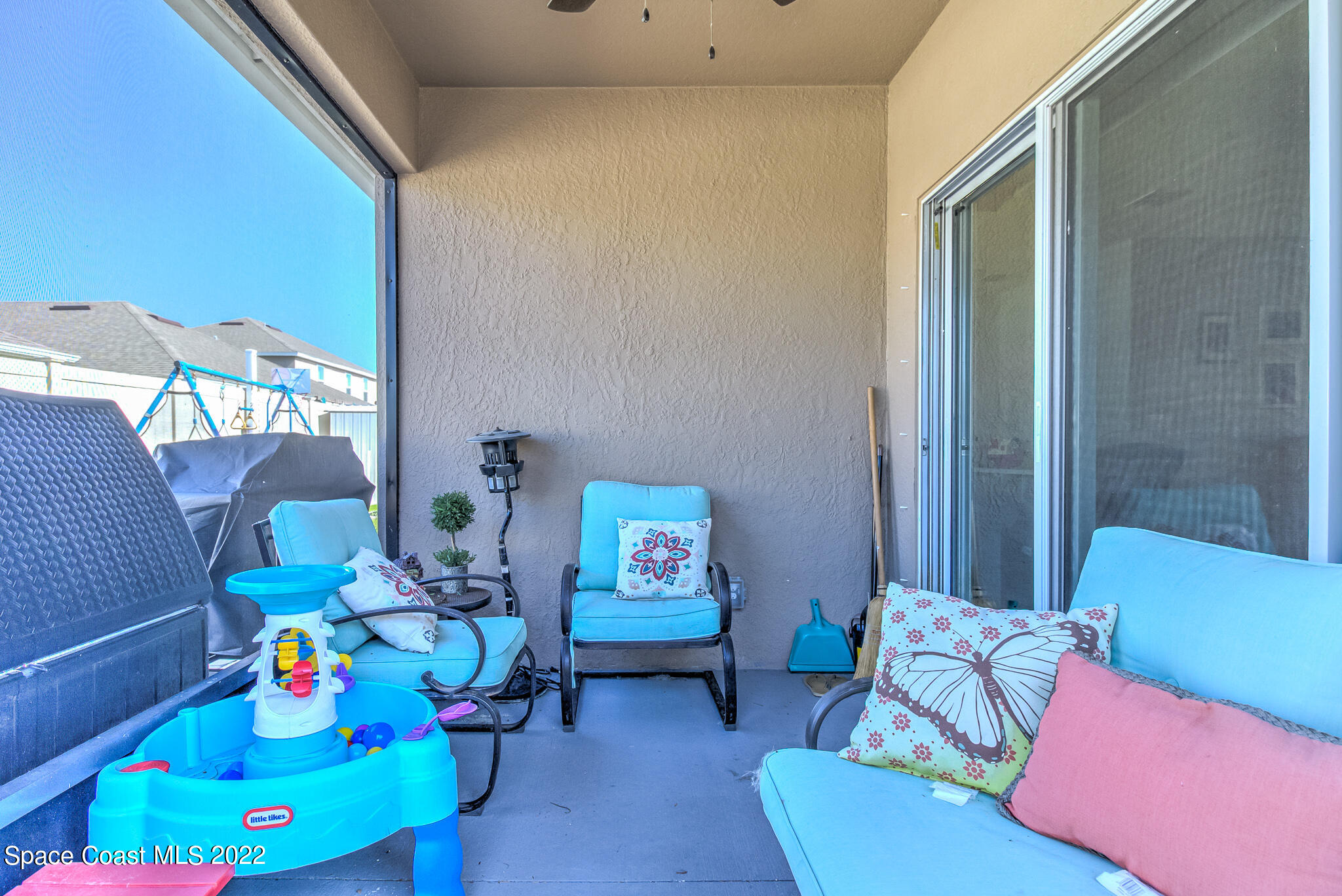975 Newton Circle Rockledge, FL 32955 - Photo 26 of 30 a living room with furniture and a couch