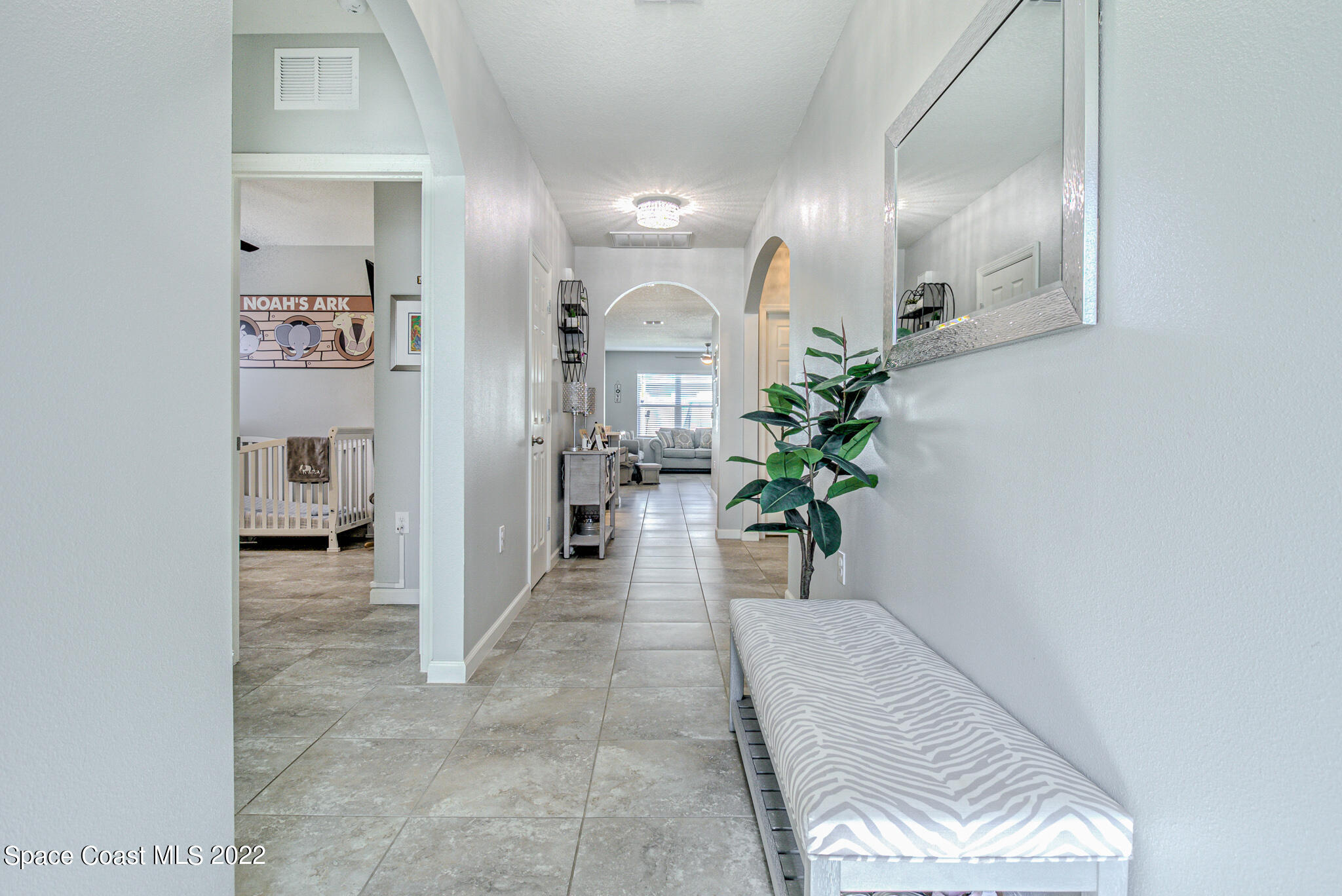 975 Newton Circle Rockledge, FL 32955 - Photo 4 of 30 a view of a hallway with dining area