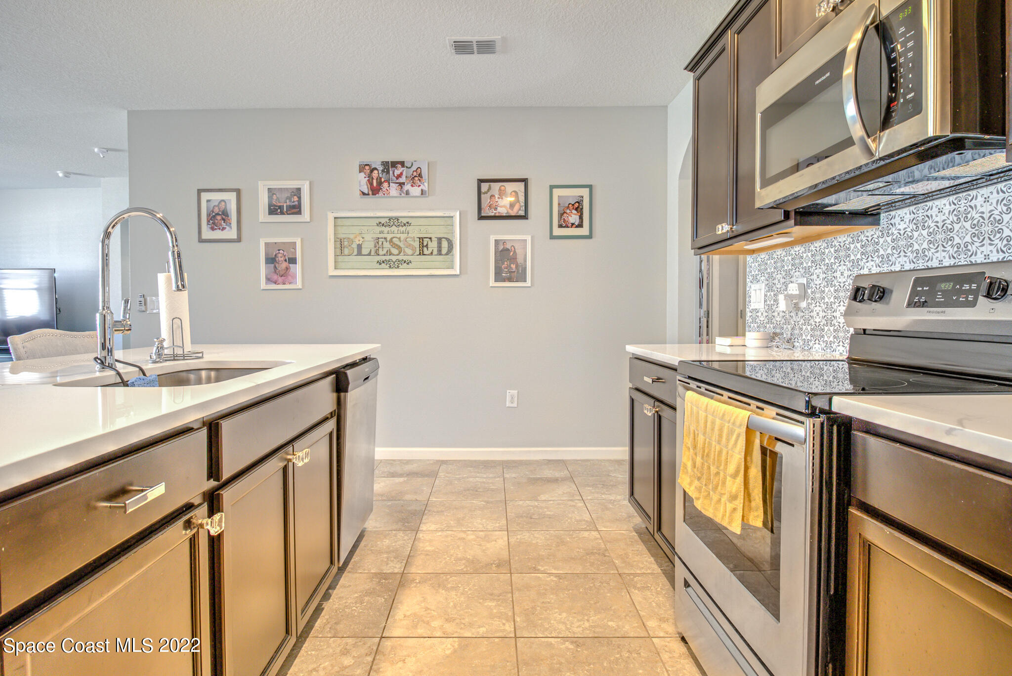 975 Newton Circle Rockledge, FL 32955 - Photo 8 of 30 a bathroom with a sink and a mirror