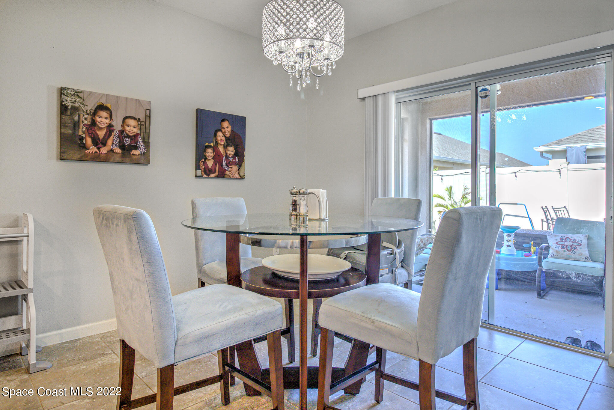 975 Newton Circle Rockledge, FL 32955 - Photo 9 of 30 a view of a dining room with furniture window and outside view