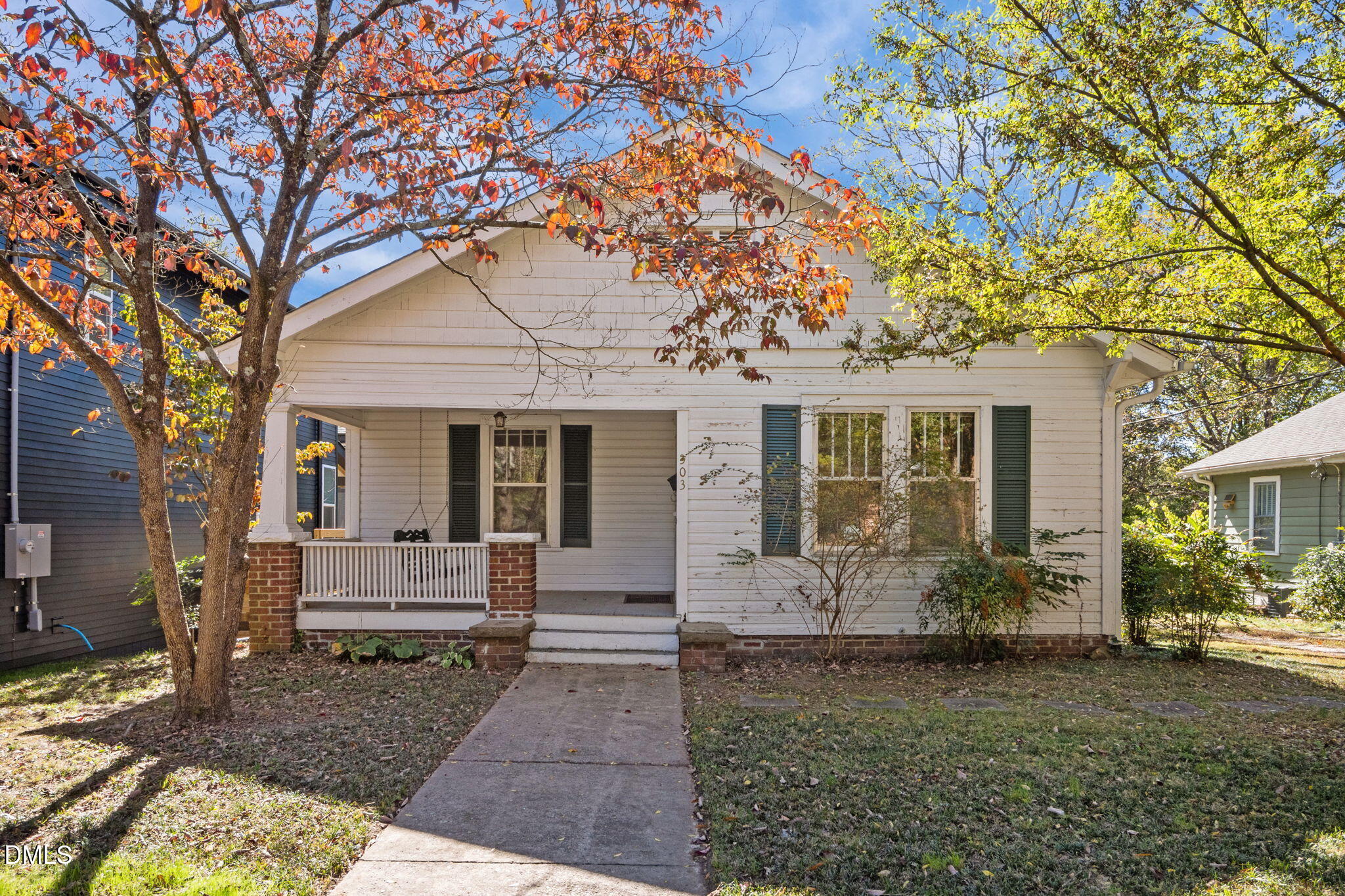 303 Clark Street Durham, NC 27701 - Photo 1 of 30 a front view of a house with garden