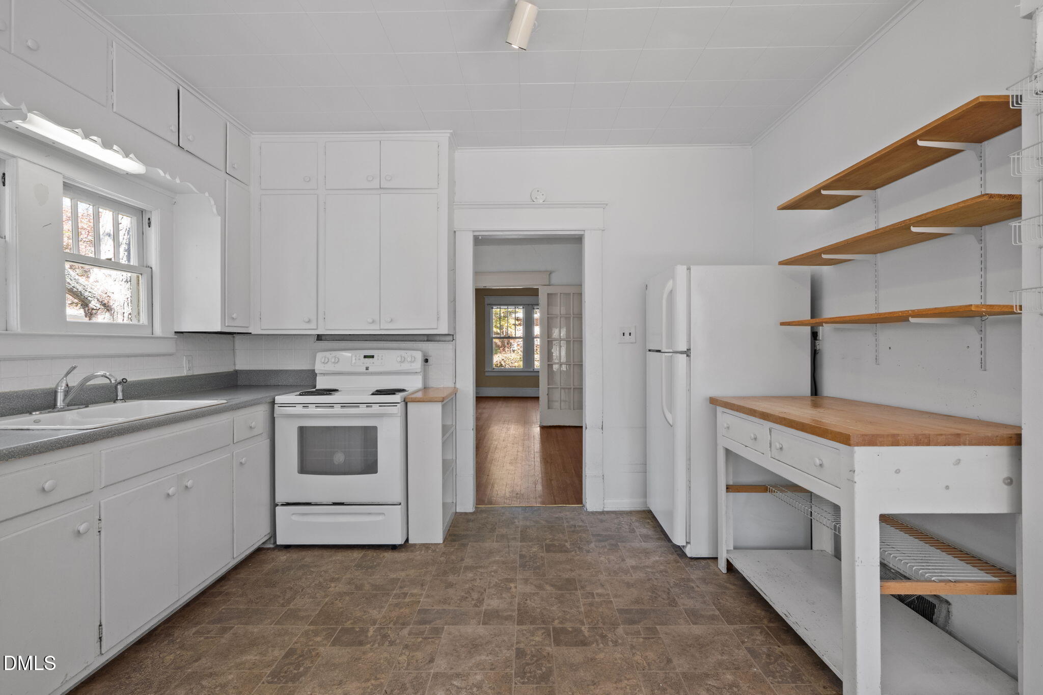 303 Clark Street Durham, NC 27701 - Photo 14 of 30 a kitchen with a stove oven and sink