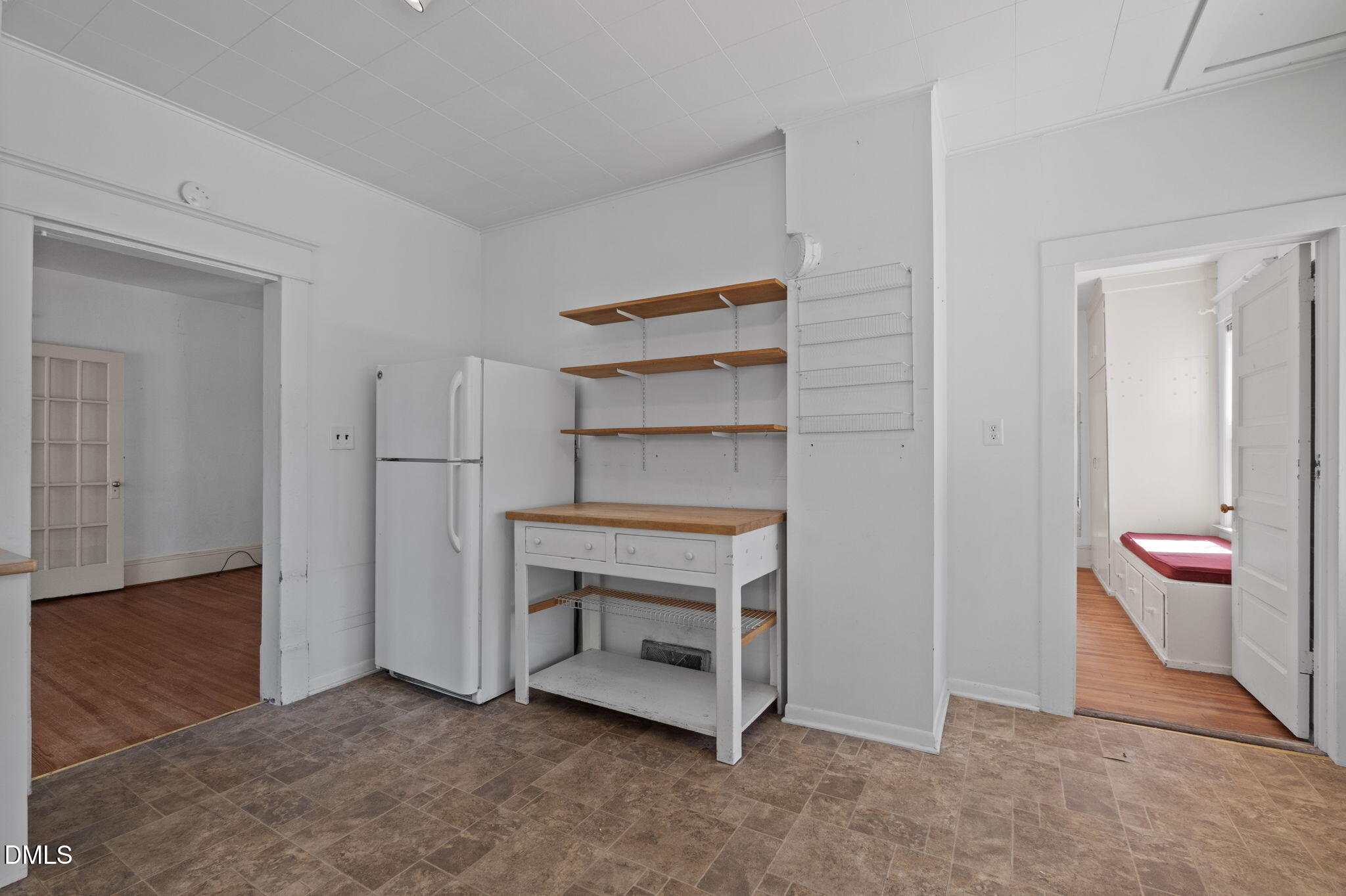 303 Clark Street Durham, NC 27701 - Photo 16 of 30 a view of an empty room and fire place