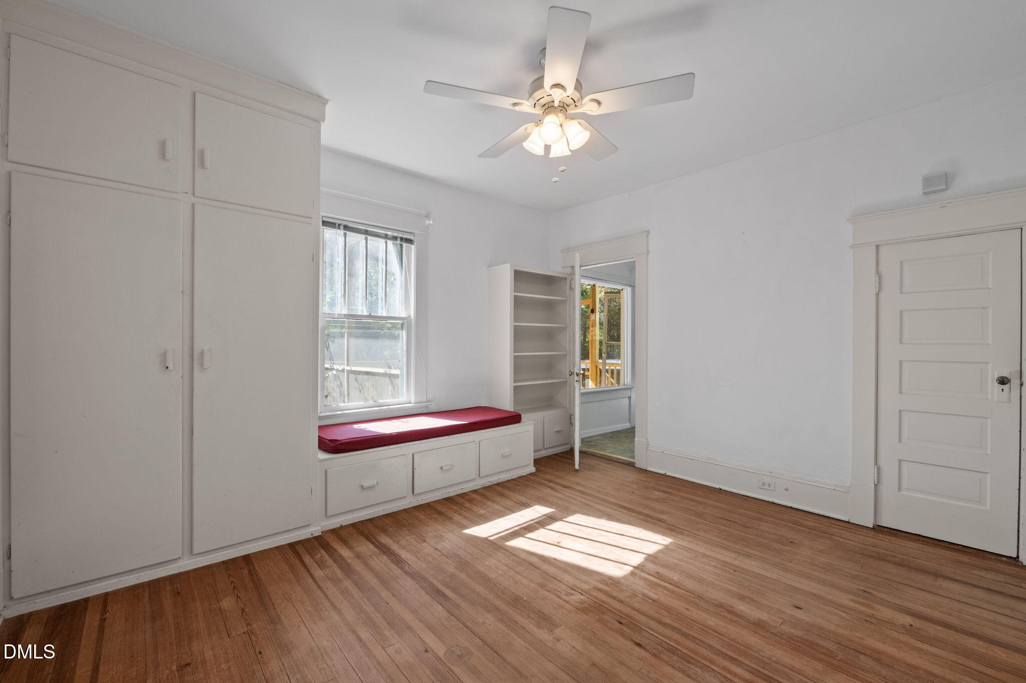 303 Clark Street Durham, NC 27701 - Photo 18 of 30 wooden floor in an empty room with a window
