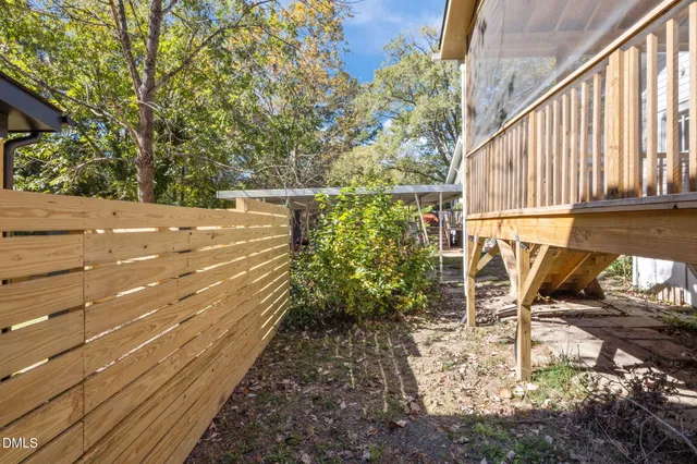 a view of balcony with wooden floor