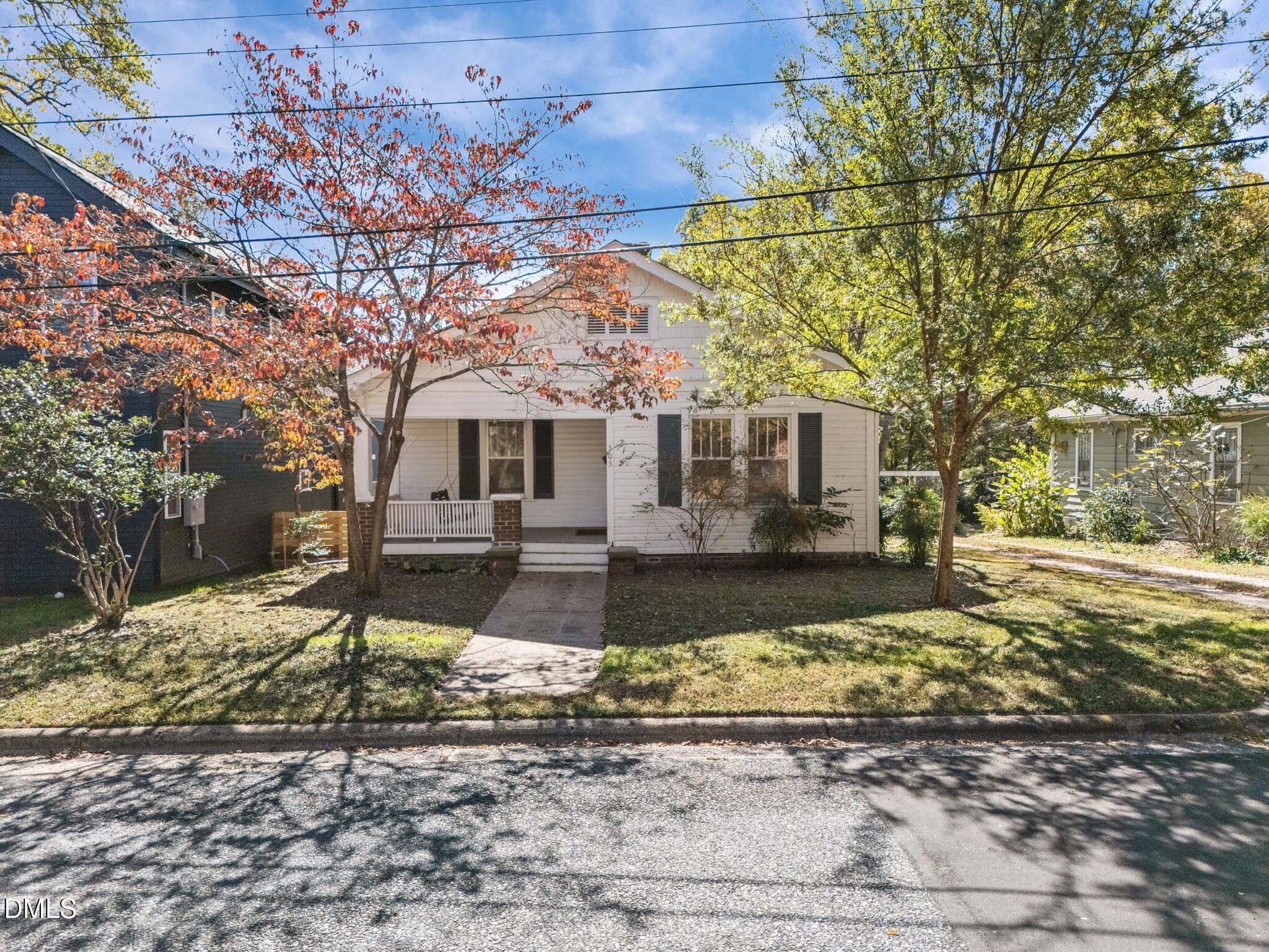303 Clark Street Durham, NC 27701 - Photo 3 of 30 a front view of a house with a yard