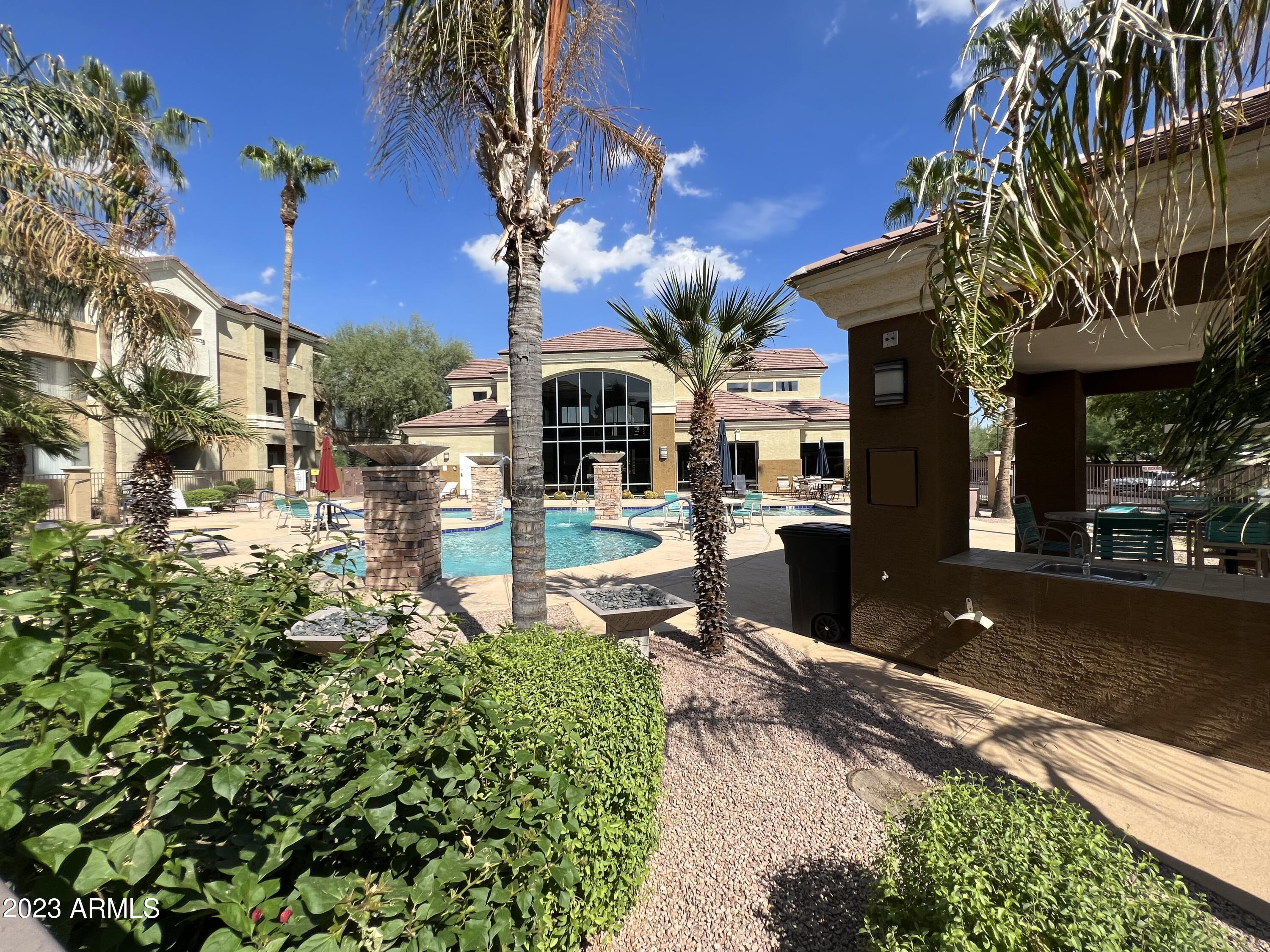 18416 North Cave Creek Road, Unit 1059 Phoenix, AZ 85032 - Photo 33 of 45 Resort Like Pool, spa, Ramada