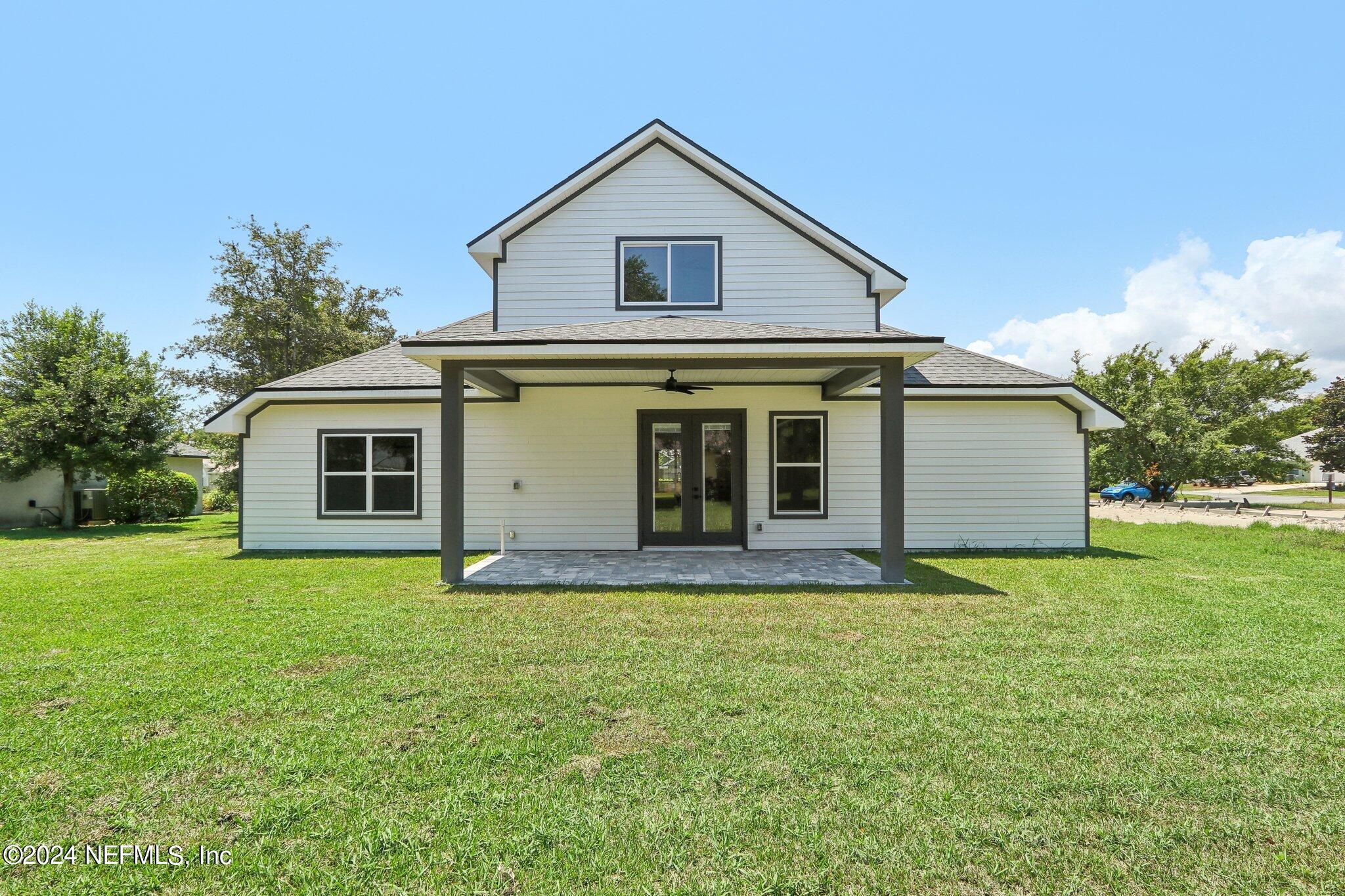 156 Cacique Drive St. Augustine, FL 32086 - Photo 18 of 68 a view of a house with a yard