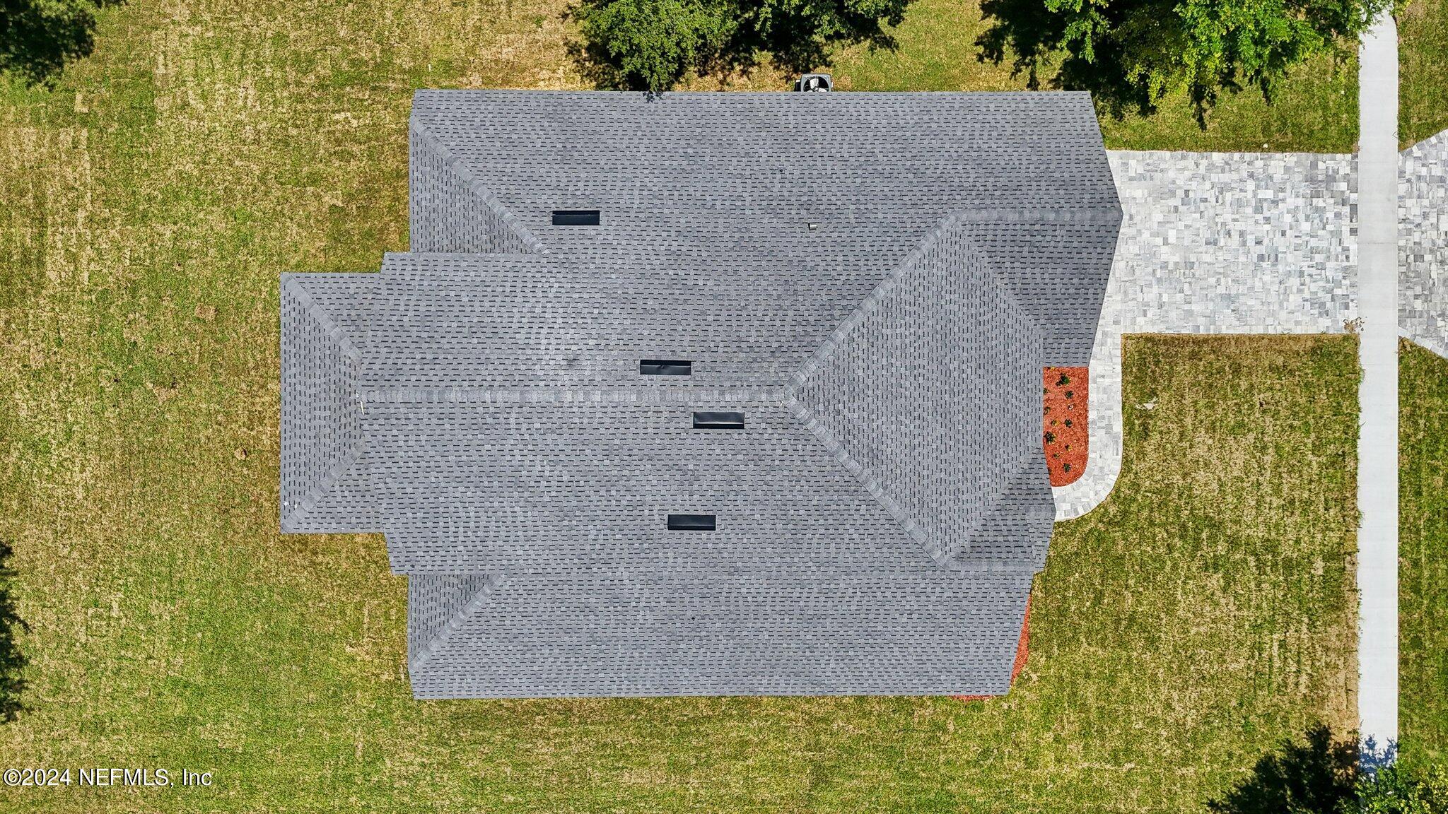 156 Cacique Drive St. Augustine, FL 32086 - Photo 40 of 68 a aerial view of a house with a yard