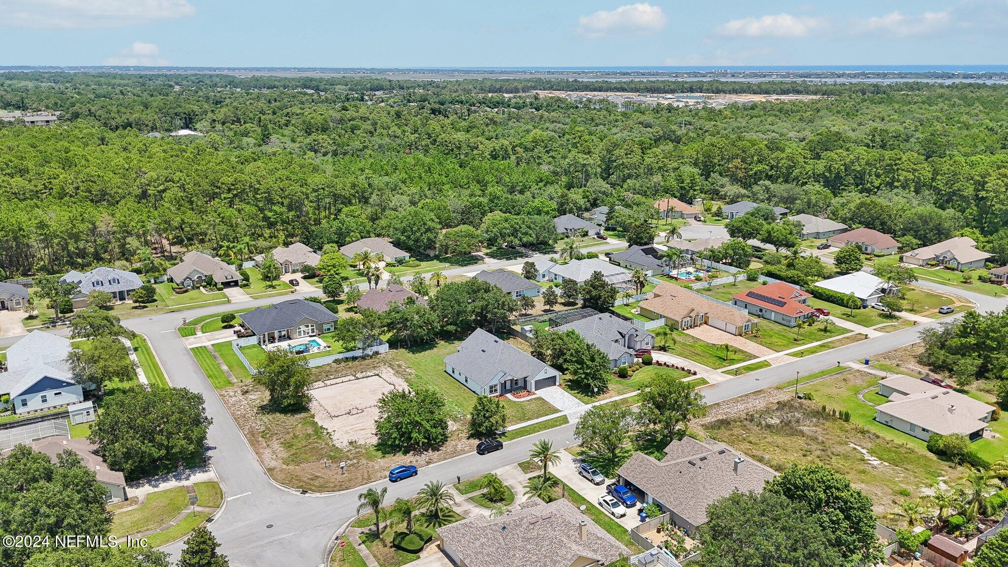 156 Cacique Drive St. Augustine, FL 32086 - Photo 44 of 68 an aerial view of multiple house
