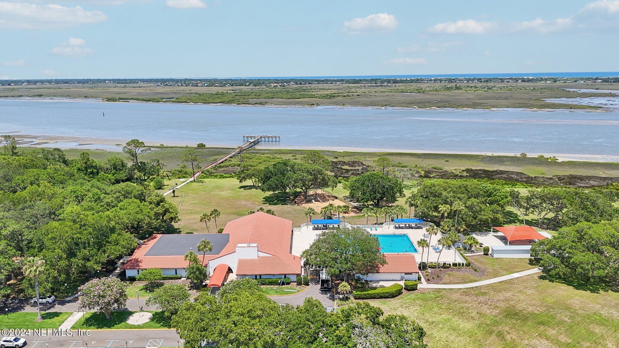 156 Cacique Drive St. Augustine, FL 32086 - Photo 54 of 68 an aerial view of a house with a lake view