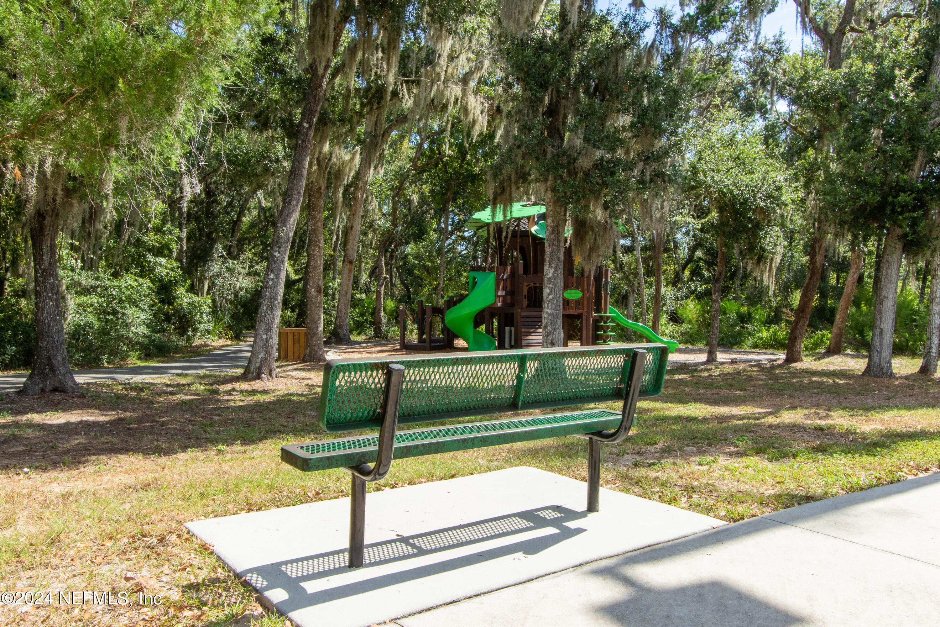 156 Cacique Drive St. Augustine, FL 32086 - Photo 62 of 68 a view of a park with plants and trees