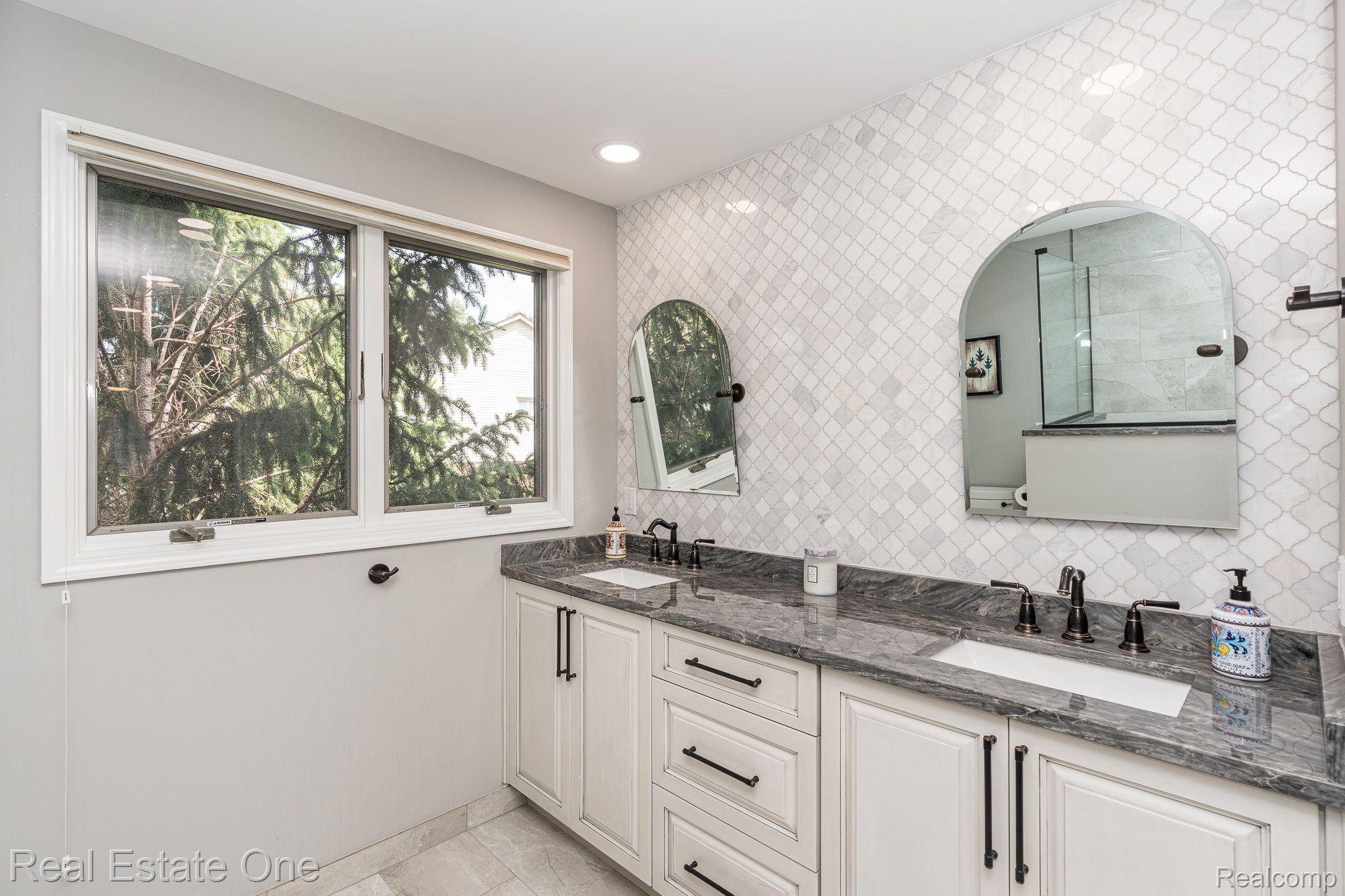 3221 Quail Ridge Circle Rochester, MI 48309 - Photo 39 of 57 Dual sinks & Mirrors