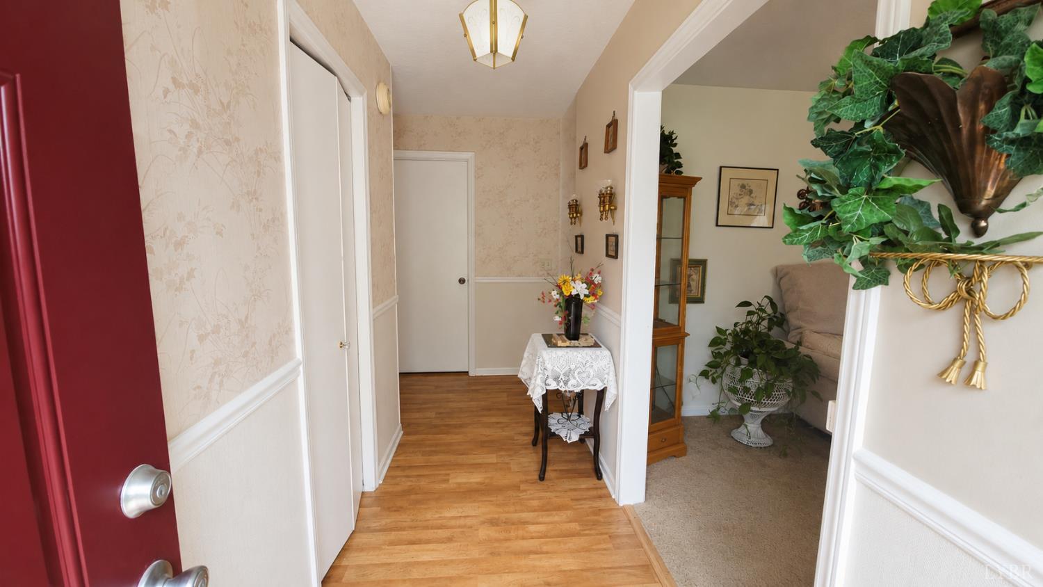 2346 Mitchell Mill Road Gladys, VA 24554 - Photo 2 of 38 a view of a hallway and a livingroom with furniture