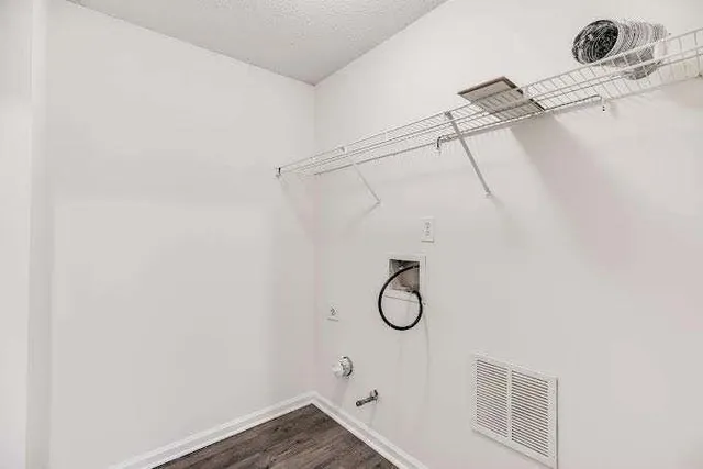 a view of a room with rack on the wall