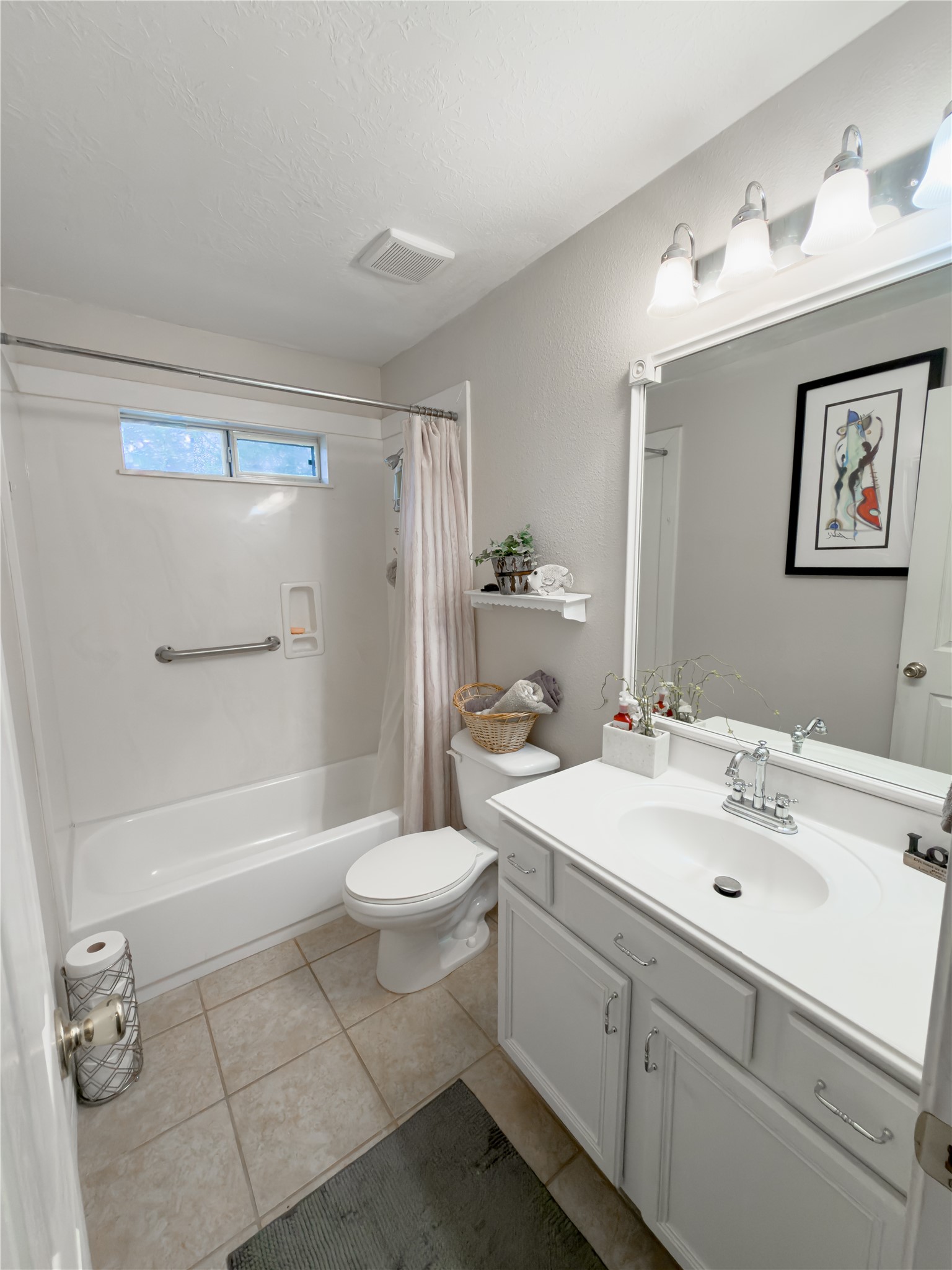 14302 Austin Bayou Drive Rosharon, TX 77583 - Photo 13 of 22 a bathroom with a sink a toilet and shower