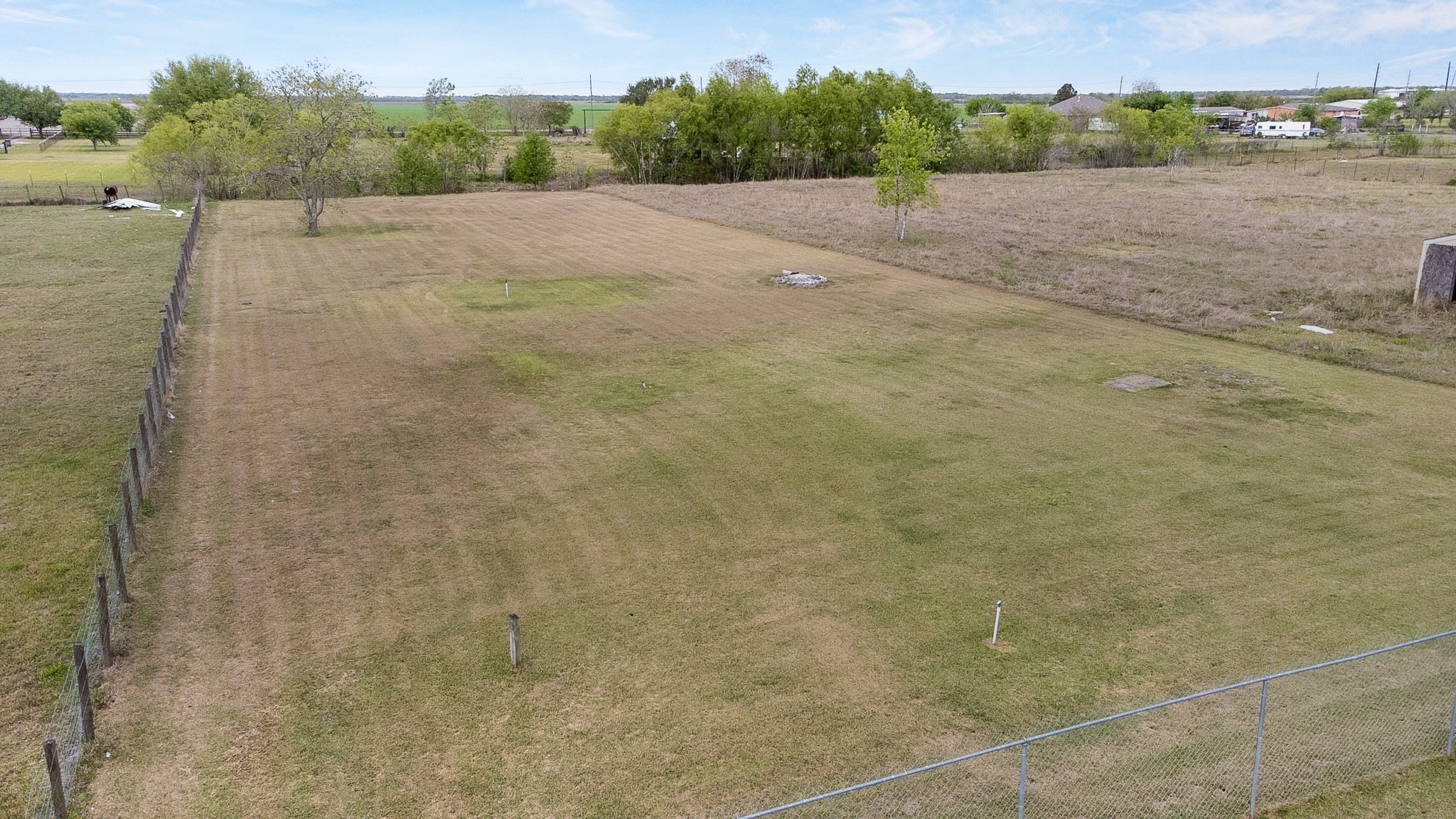 14302 Austin Bayou Drive Rosharon, TX 77583 - Photo 15 of 22 a view of an outdoor space and a yard