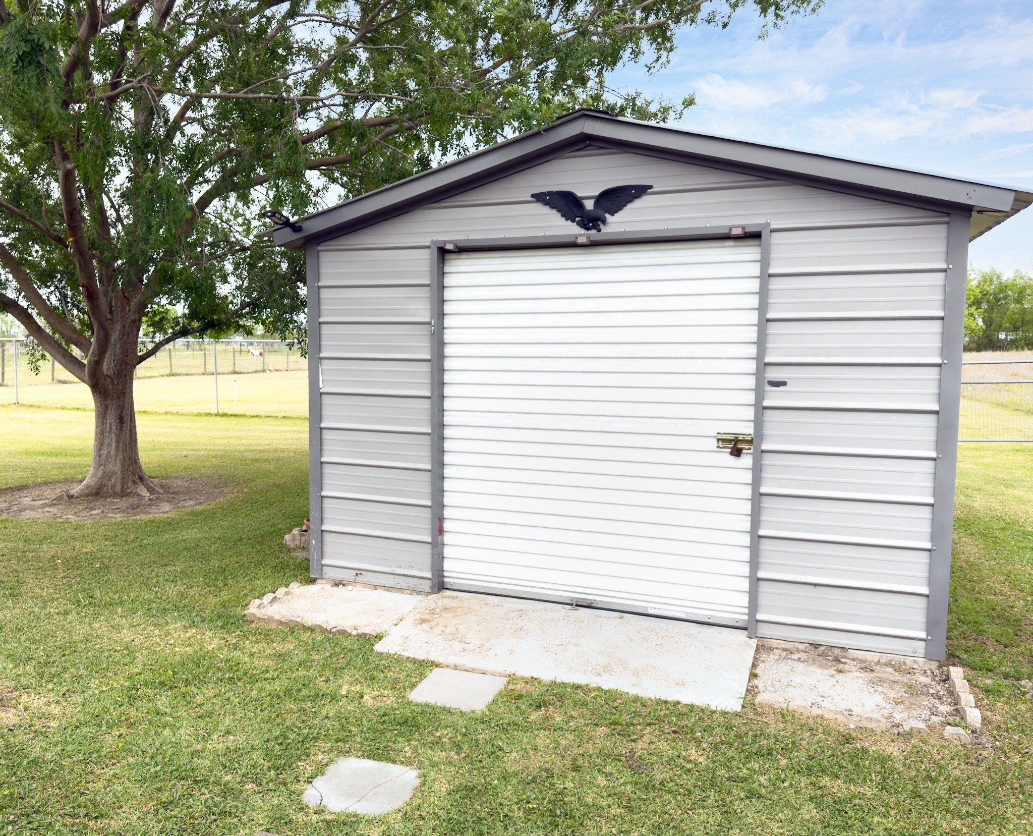 14302 Austin Bayou Drive Rosharon, TX 77583 - Photo 18 of 22 a view of a house with a yard