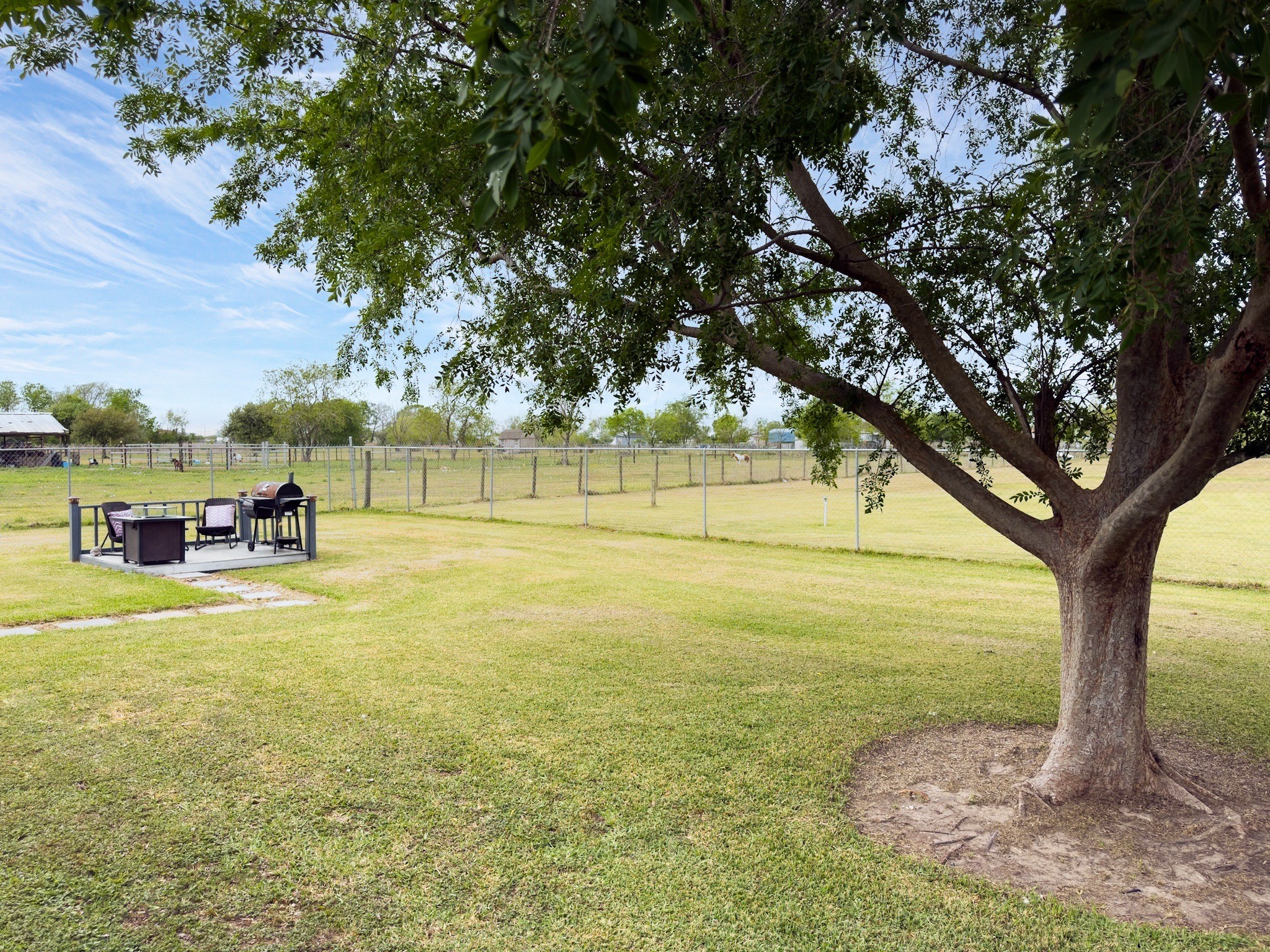 14302 Austin Bayou Drive Rosharon, TX 77583 - Photo 22 of 22 a view of a yard with an trees
